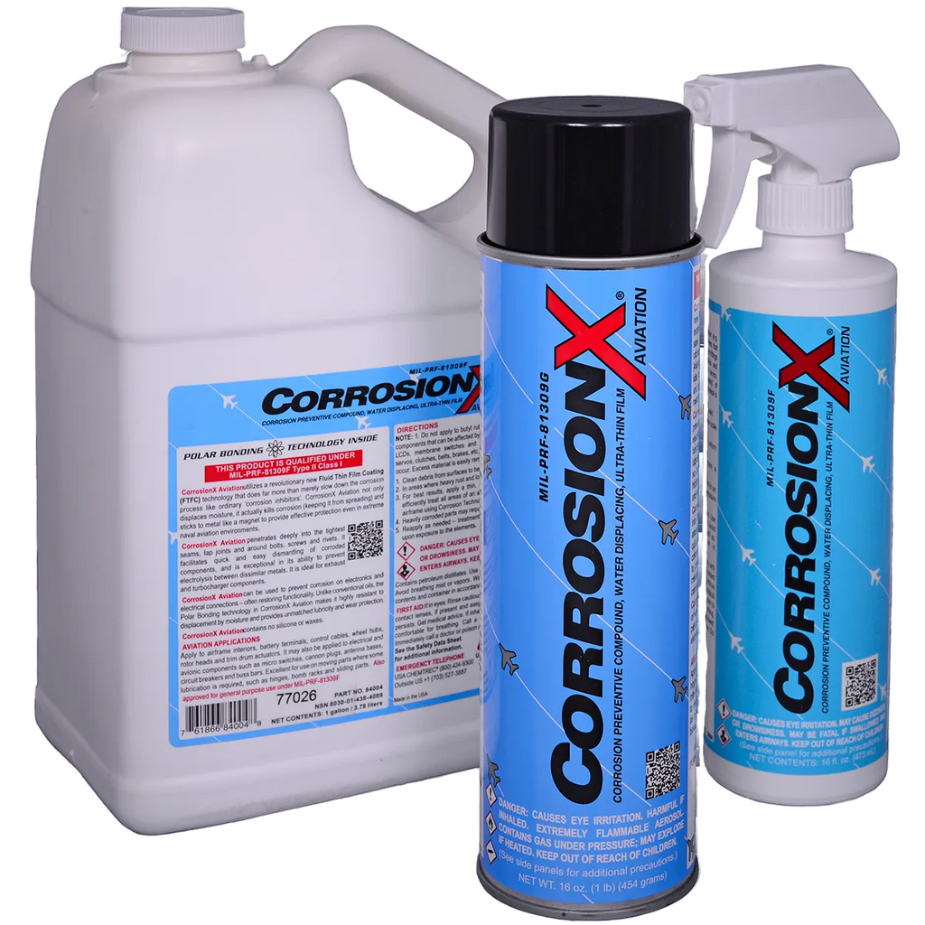 Three bottles of Corrosion X on a white background